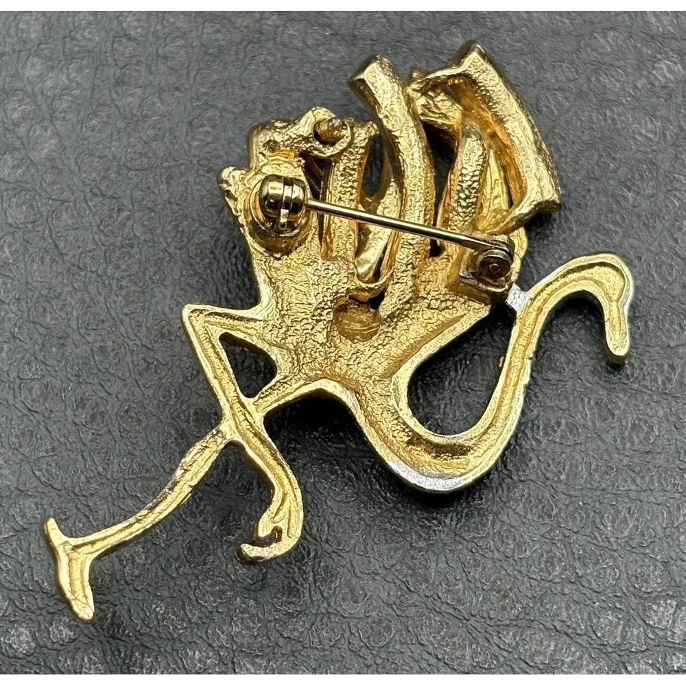 The Unbranded Brand brooch has